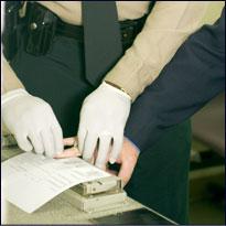 Person being fingerprinted